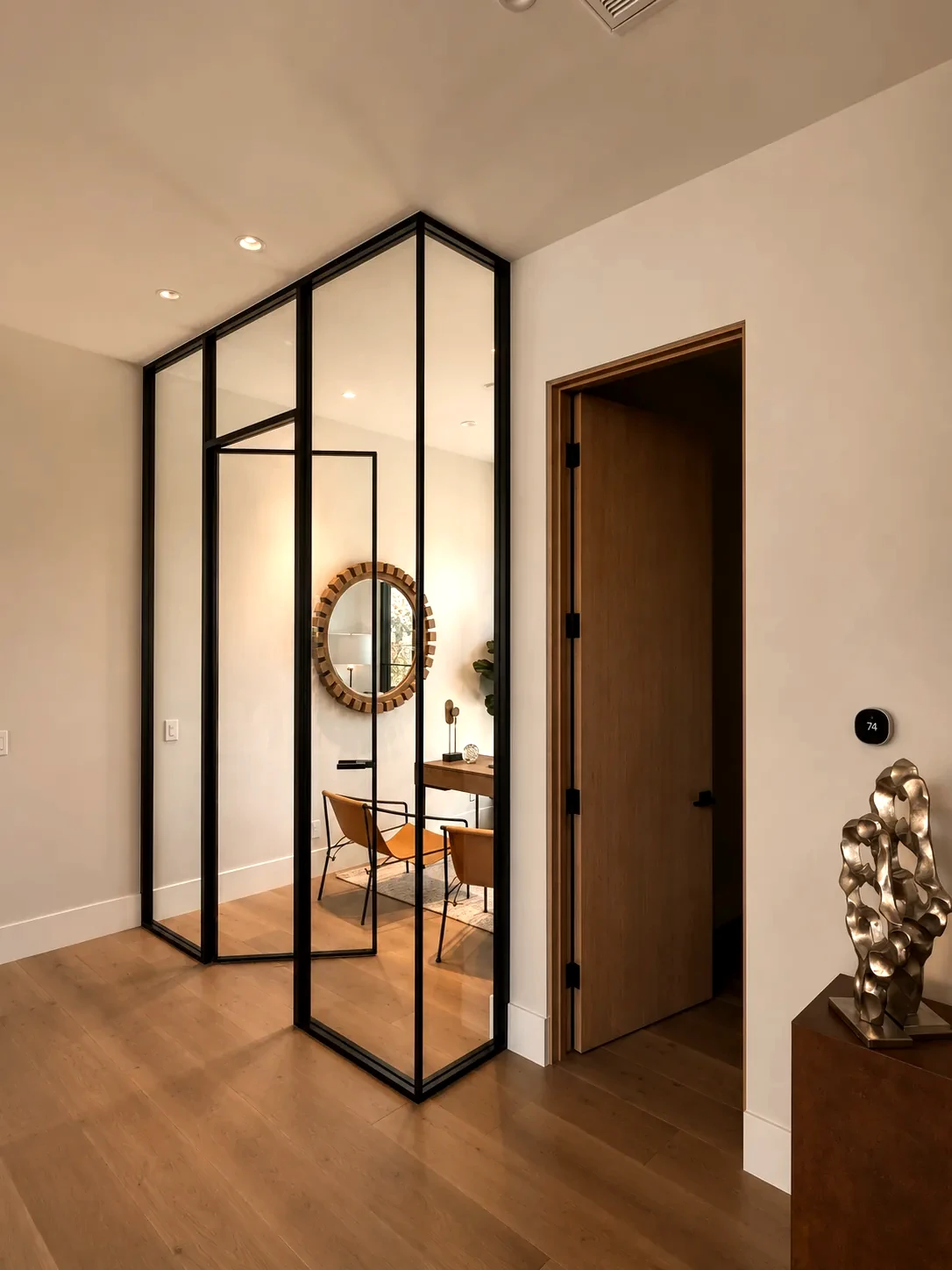 Aeres corner glass partition system in an office