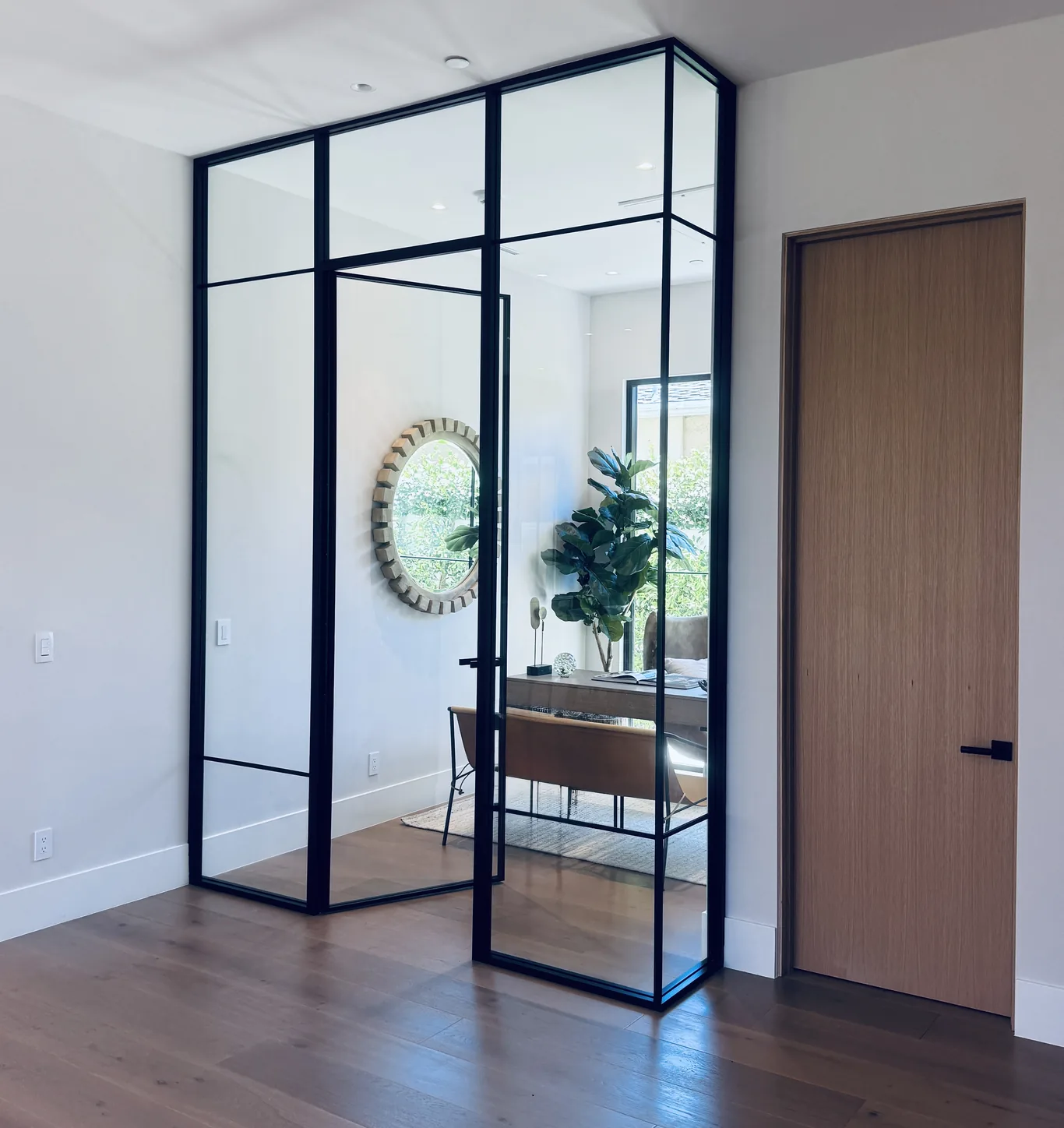 Aeres corner glass partition system viewed at an angle